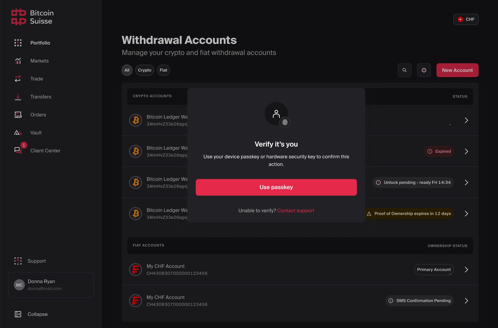 Withdrawal Accounts page with status labels such as Expired, Unlock pending and SMS Confirmation Pending, and a Verify it's you window asking the client to confirm with a passkey.